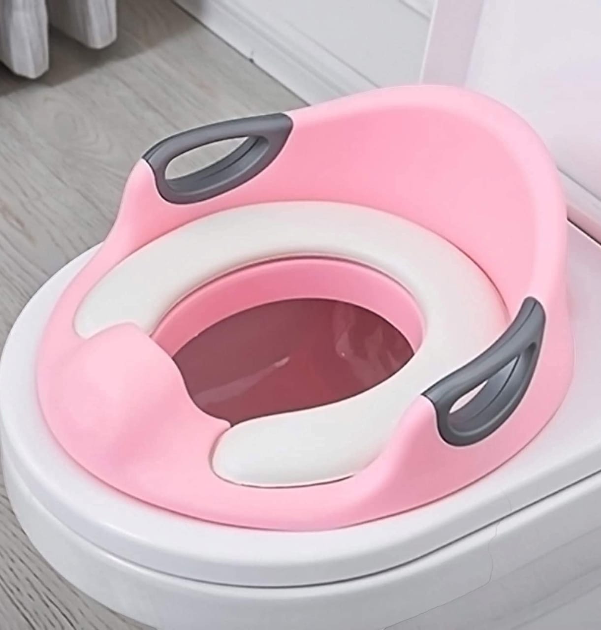 Pink Potty training seat with handle